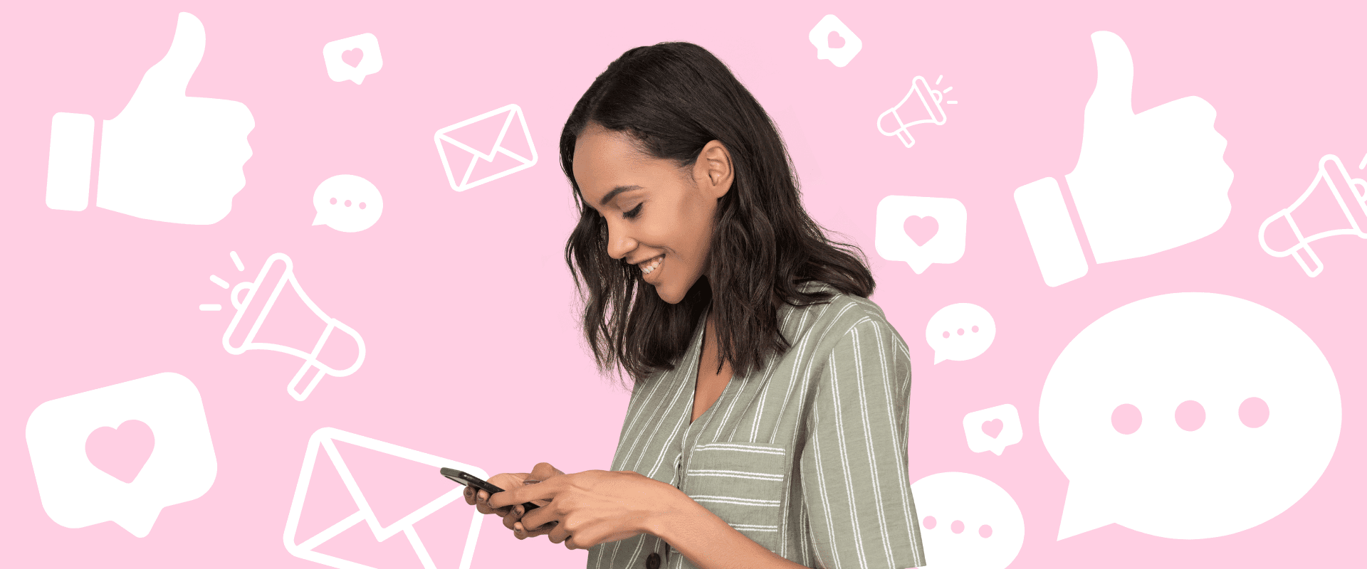 A woman holding a cell phone in front of a pink background with social icons.